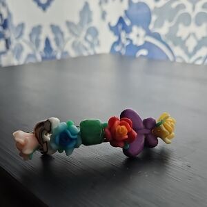 Kids Multicolor Floral Hair Clip with Purple Accent